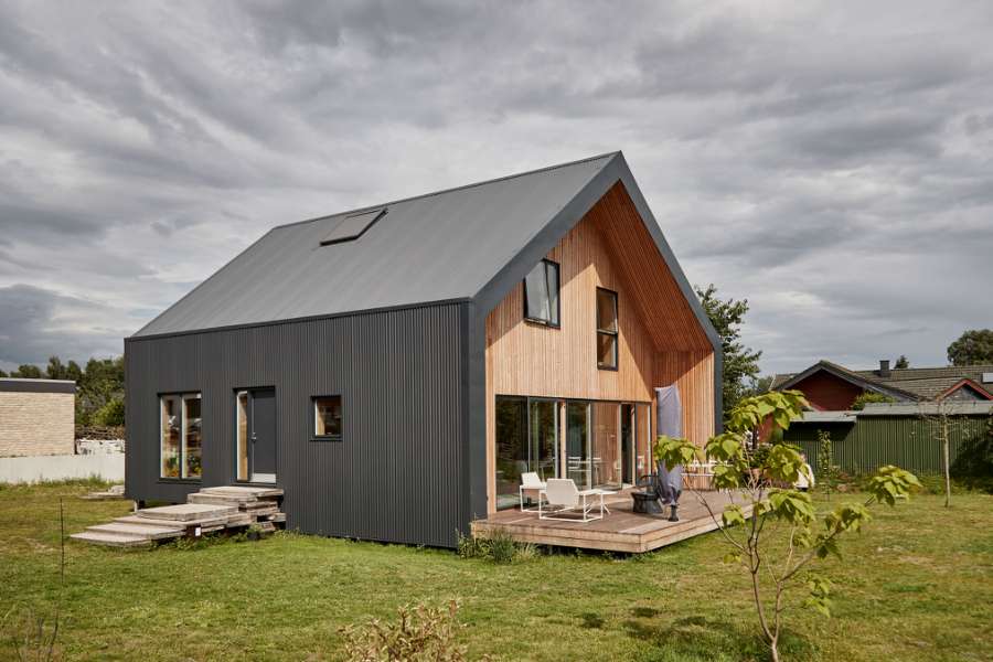 „Pinteressante“ Dach- und Fassadenlösung mit Sinusprofilen,